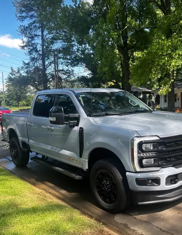 Silver Ford Super Duty truck after a full exterior detail